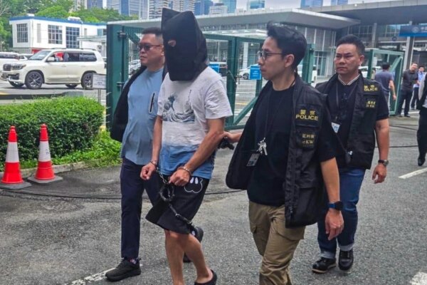 Hong Kong police to prosecute 7th suspect in 1999 murder, seeking 8th