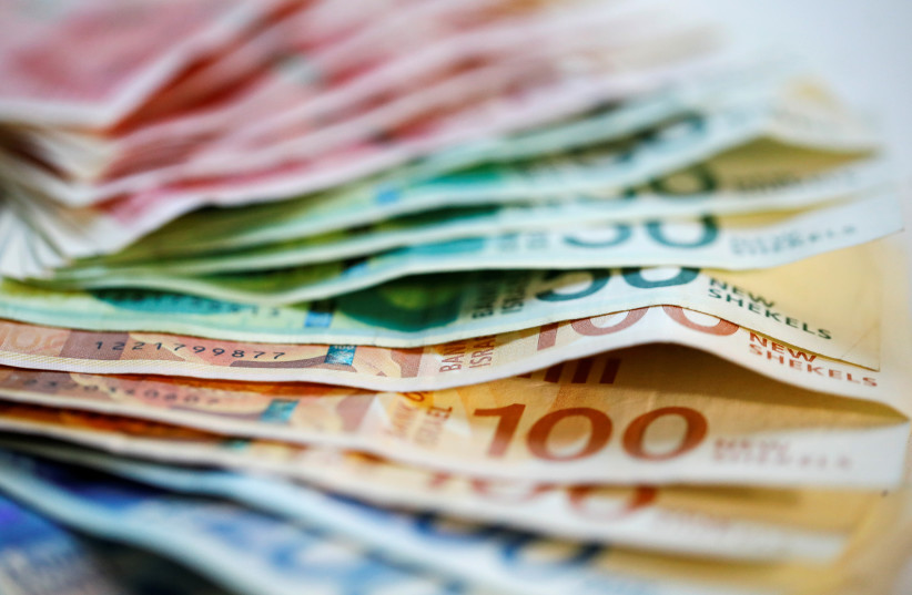 New Israeli Shekel banknotes are seen in this picture illustration.