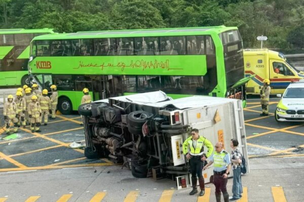 10 injured in truck-bus crash outside Hong Kong shopping centre