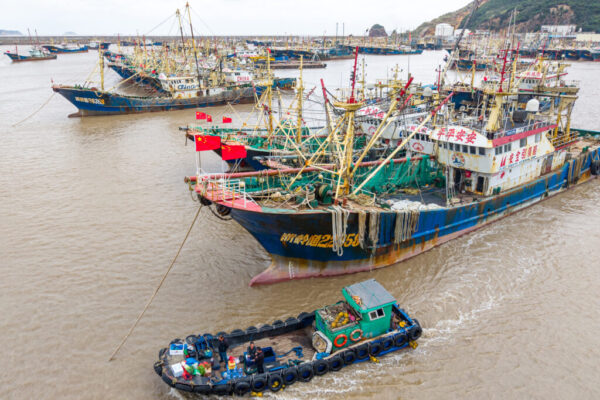 Chinese fishing vessels are seen moored at a port in Taizhou, China. Credit: Xu Weijie/VCG via Getty Images