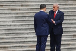 Trump shakes hands with Xi at start of historic U.S.-China summit