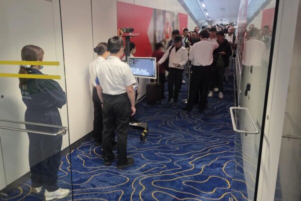 Centre for Health Protection personnel strengthened health screenings for passengers arriving on flights from Africa