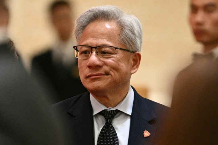 Nvidia founder and CEO Jensen Huang arrives ahead of a state banquet for US President Donald Trump and China's President Xi Jinping at the Great Hall of the People Beijing on May 14, 2026 (Brendan SMIALOWSKI)