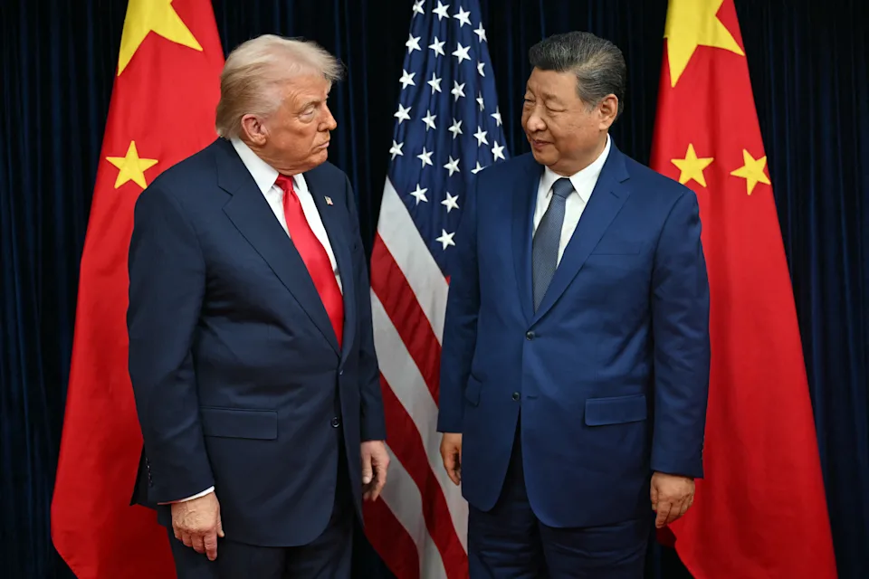 Trump and Chinese President Xi Jinping greet each other as they arrive for talks at in Busan, South Korea on October 30, 2025.