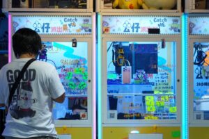 A man tries his luck at a claw machine shop in Causeway Bay. Photo: Jelly Tse