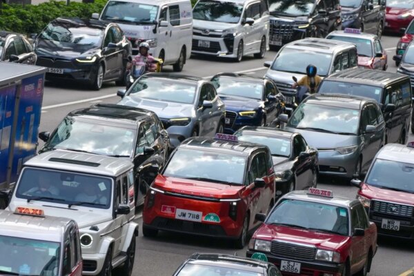 Ride-hailing licence cap ‘must strike a balance’ in Hong Kong, John Lee says