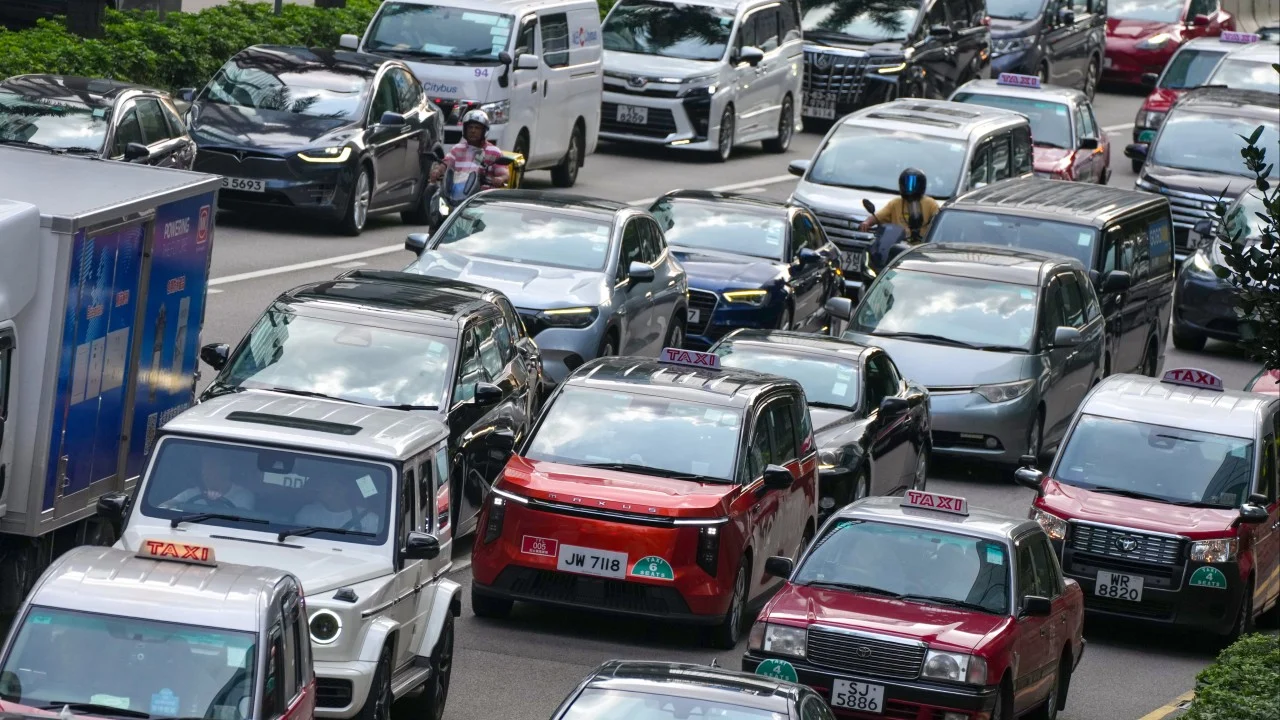 Ride-hailing licence cap ‘must strike a balance’ in Hong Kong, John Lee says