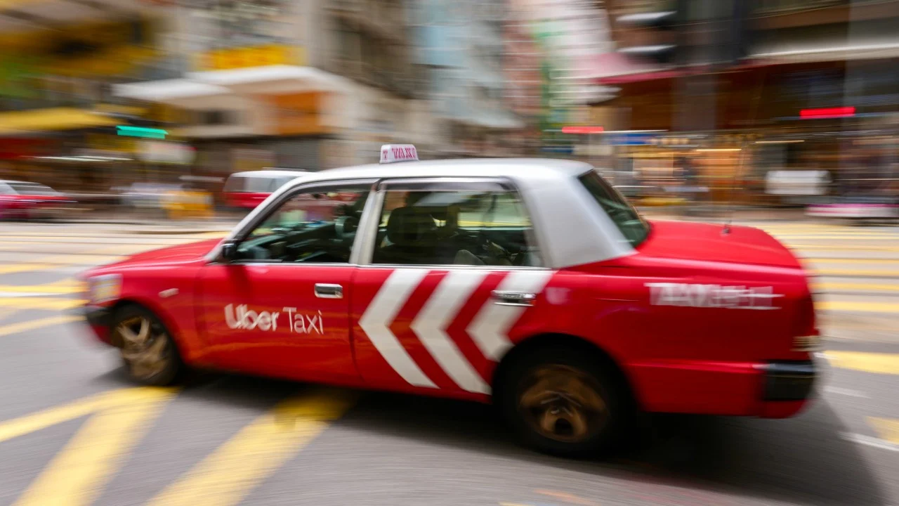 Uber says Hong Kong ride-hailing cap ‘unusual’, insists it’s here to stay