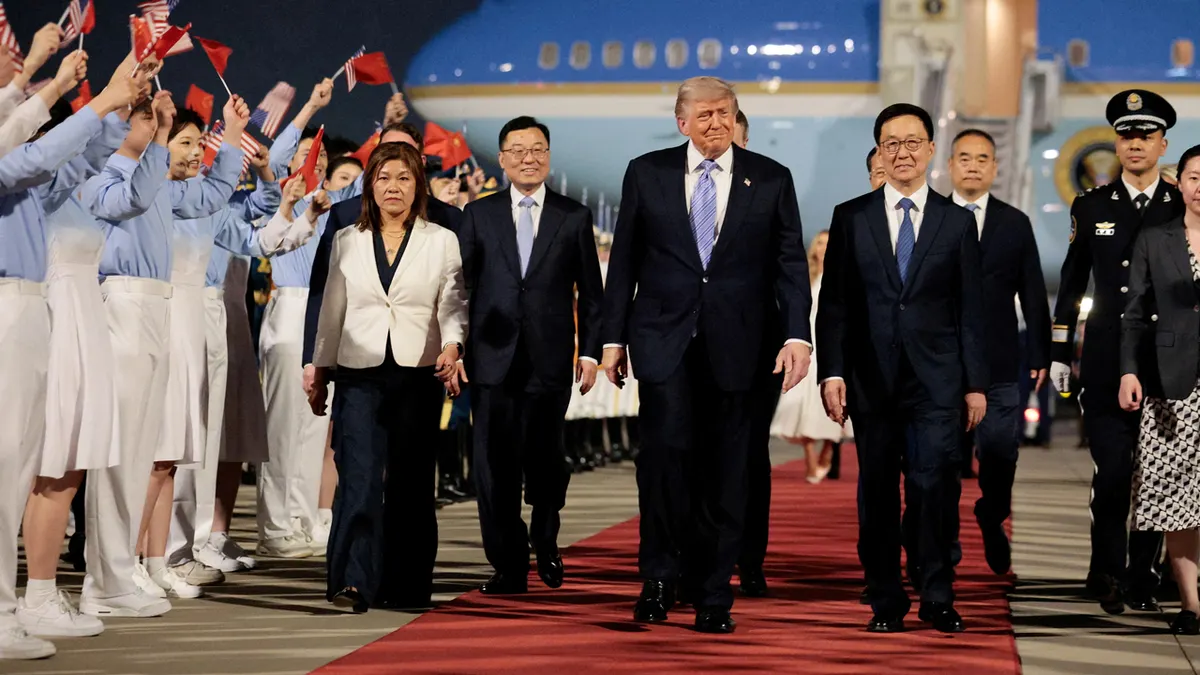 Trump with chinese vice president as he arrives in china