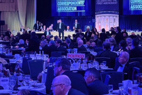 U.S. Secret Service agents respond near President Donald Trump and first lady Melania Trump during the White House Correspondents Dinner, in Washington, April 25, 2026. (AP Photo/Alex Brandon, File)