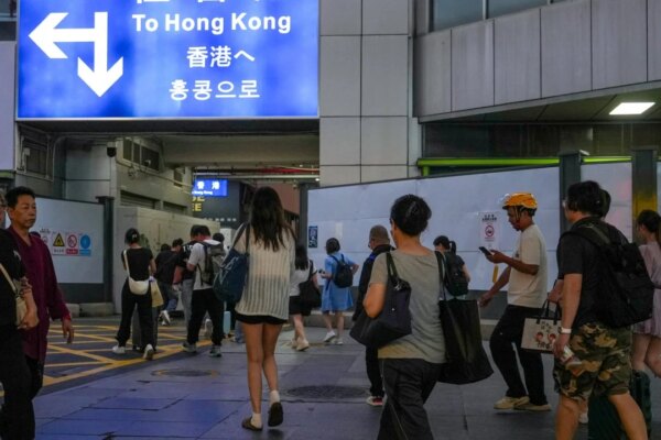 Mainland China revises criteria for settling in Hong Kong, Macau