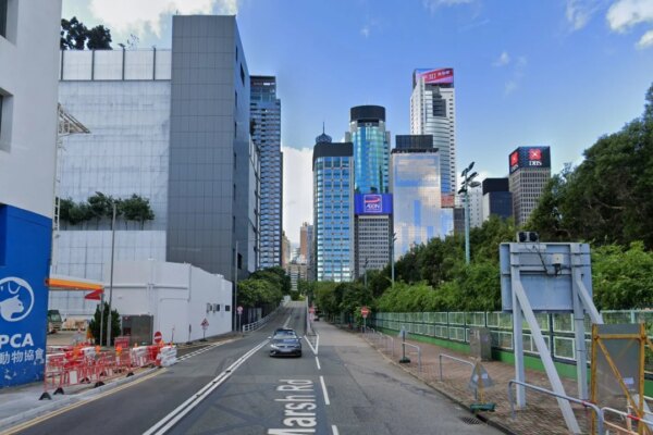 Hong Kong police arrest 15-year-old driver and his father in Wan Chai