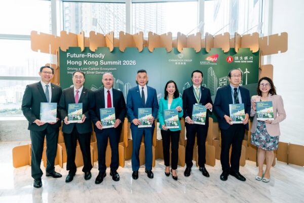 Delegates present the ‘Creating a Green and Silver Economy’ white paper to attendees at the Future-ready Hong Kong Summit 2026.