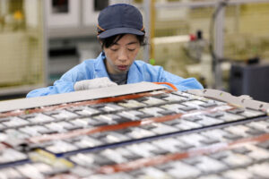 An employee works on a battery assembly line at the factory of Leapenergy, a unit of Leapmotor, during an organised media tour in Huzhou, Zhejiang province, China, April 26, 2026.