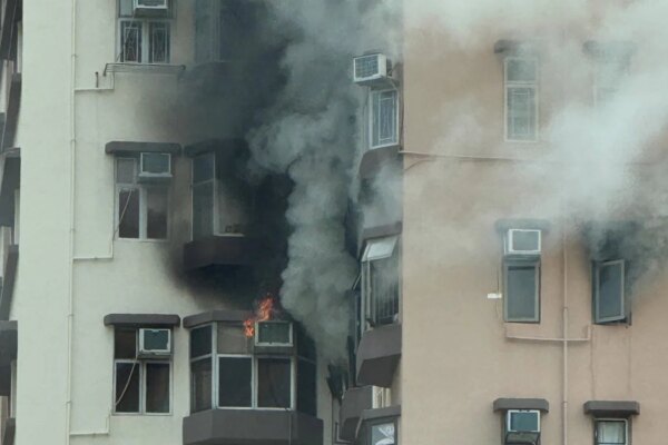 Woman dies after fire at Hong Kong flat, 3 others hospitalised