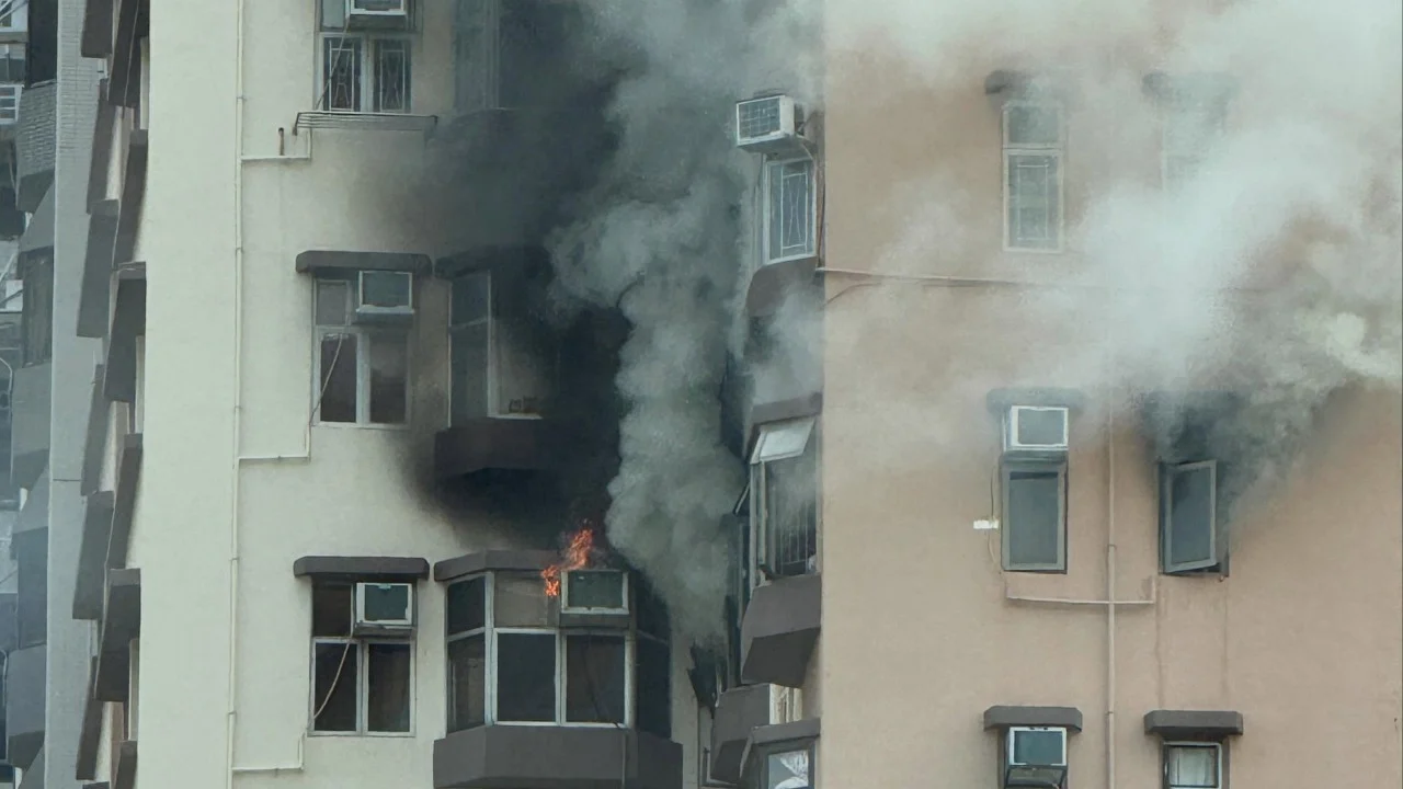Woman dies after fire at Hong Kong flat, 3 others hospitalised
