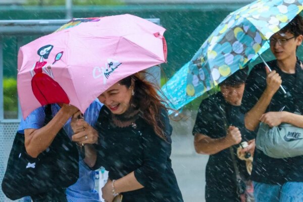 Hong Kong issues amber rainstorm warning as thundery showers lash city