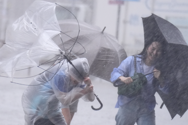 HKO cancels red rainstorm alert after rains batter city