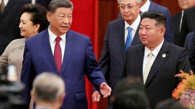 FILE PHOTO: Chinese President Xi Jinping and North Korean leader Kim Jong Un arrive for a reception marking the 80th anniversary of the end of World War Two, at the Great Hall of the People in Beijing, China September 3, 2025. REUTERS/Florence Lo/File Photo/File Photo (REUTERS)