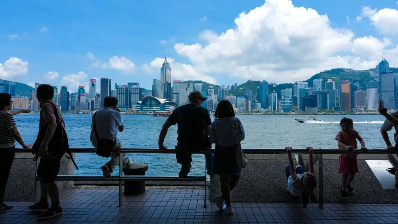 Hong Kong braces for heat, showers as tropical depression passes nearby