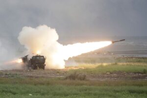 A rocket is launched from a High Mobility Artillery Rocket System (HIMARS) during a military live-fire shooting training in Taichung City, Taiwan, Wednesday, June 10.