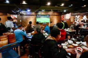 Replays, lucky draws: Hong Kong eateries chase World Cup business despite time difference