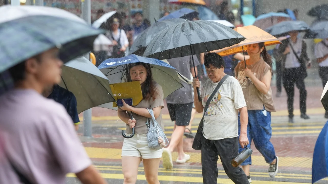Hong Kong Observatory cancels amber rainstorm warning but more downpours forecast