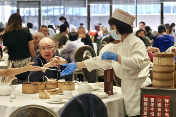 Hong Kong tightens imported worker scheme but open to making it permanent