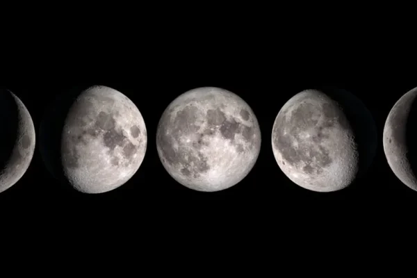 Five versions of the moon in a line, each showing a different phase.