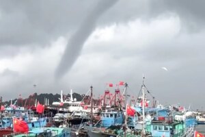Hong Kong cancels red rainstorm warning after hour as suspected waterspout spotted