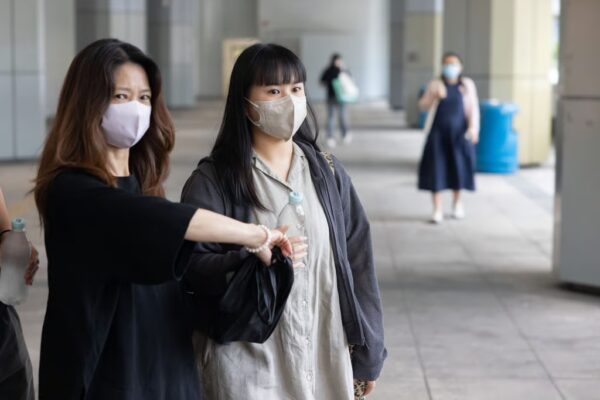 Park Hoi-lam (right) leaves the High Court on Tuesday. She has accused cabby Henry Cheng of negligence. Photo: Brian Wong