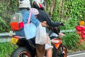 Online photo of overloaded motorcycle carrying child and 2 riders leads to arrest