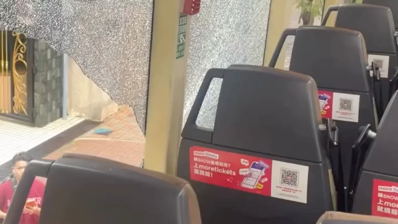 Tree branch smashes Hong Kong double-decker bus window, 1 passenger injured