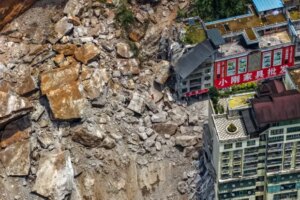 In this photo released by Xinhua News Agency, rescuers conduct...