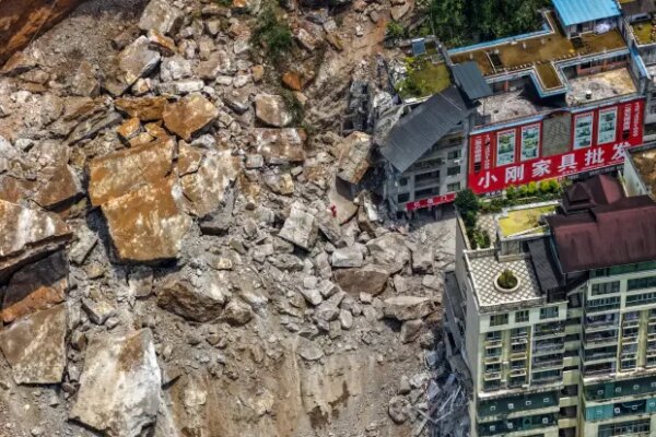 In this photo released by Xinhua News Agency, rescuers conduct...
