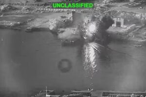 Smoke rises after a U.S. one-way attack surface drone reached its target, a submarine and ship maintenance facility according to U.S. Central Command, in Bandar Abbas, Iran, in this screengrab taken from a video, which was released July 13, 2026. (US Central Command/Handout via REUTERS )