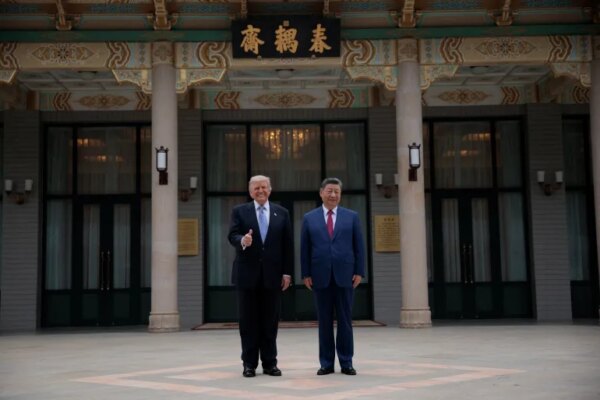 US President Donald Trump poses for a picture with Chinese President Xi Jinping during a visit to the Zhongnanhai garden in Beijing, China, on May 15, 2026
