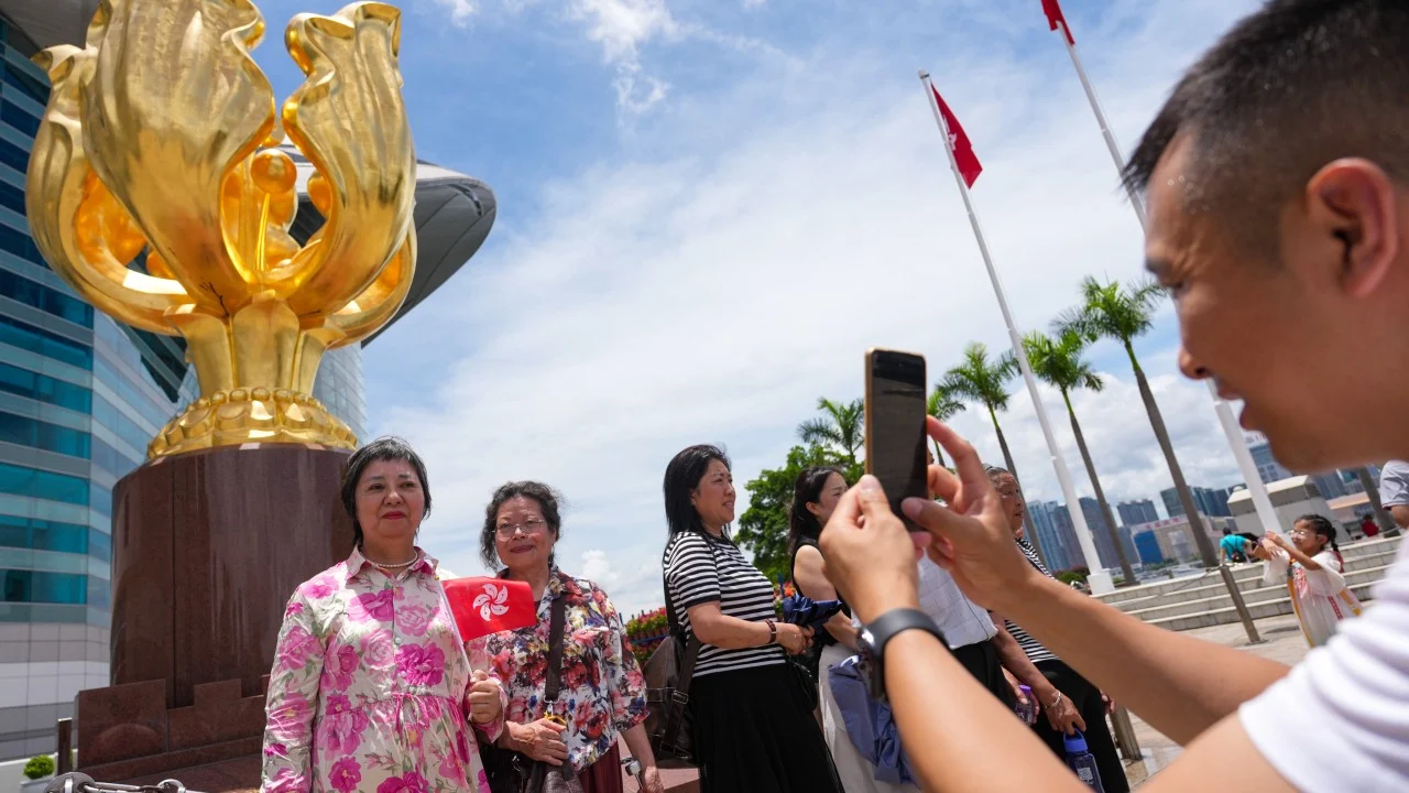 Mainland Chinese tourists pack landmarks as Hong Kong marks 29th anniversary