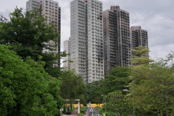 Hong Kong to tighten contractor oversight after Tai Po blaze, minister vows