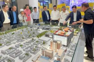 Lawmakers are briefed on work in the Longfu Temple Historical and Cultural District. Photo: Handout