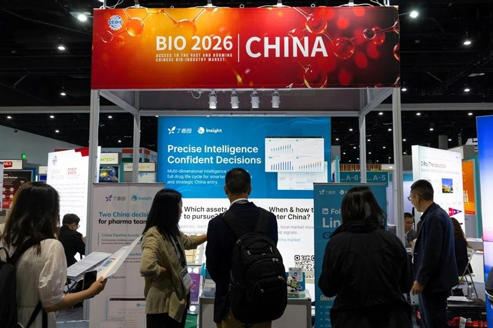 Attendees look at the China booth at the BIO International Convention 2026, a meeting of pharmaceutical and biotechnology leaders in San Diego, California, US, on 23 June 2026.