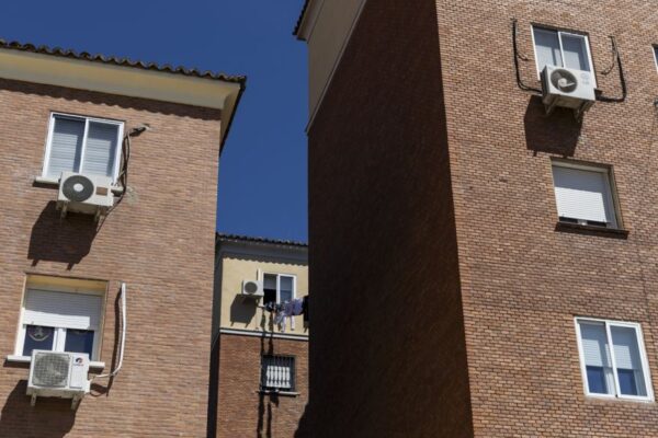 Air conditioning units on apartment buildings in Madrid, Spain. Europe has been slow to adopt widespread use of air conditioning.