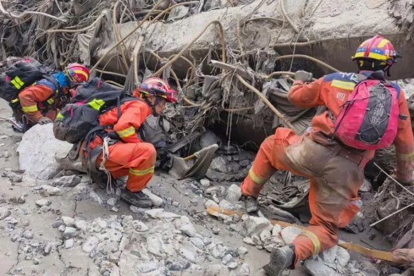 In this photo released by Xinhua News Agency, rescuers carry out search and rescue operations at the mudslide-hit area in Gyirong County, southwest China's Tibet Autonomous Region on Saturday, Aug. 29, 2026. (Zheng Lijun/Xinhua via AP)