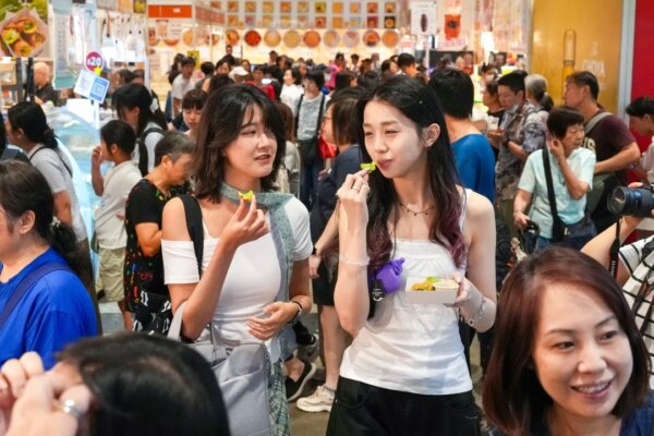 Thousands of bargain hunters descend on Hong Kong’s Food Expo despite heatwave