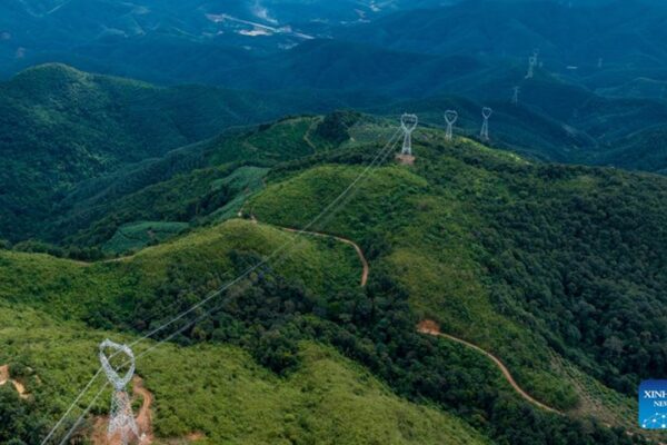 This file photo taken on Nov. 11, 2025 shows a section of power transmission line of the China-Laos 500-kV interconnection project in Mengla County, Xishuangbanna Dai Autonomous Prefecture, southwest China's Yunnan Province. China's first 500-kV cross-border alternating-current power interconnection project went into operation on Monday, sharply expanding electricity exchange capacity between China and Laos, China Southern Power Grid Co., Ltd. said. (China Southern Power Grid/Handout via Xinhua)

