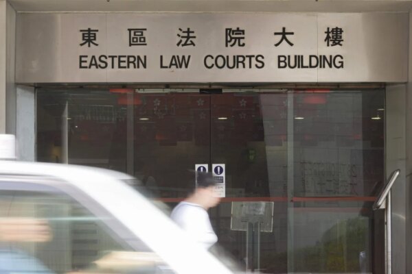 Hong Kong government statistician cleared of loitering charge near girls’ school