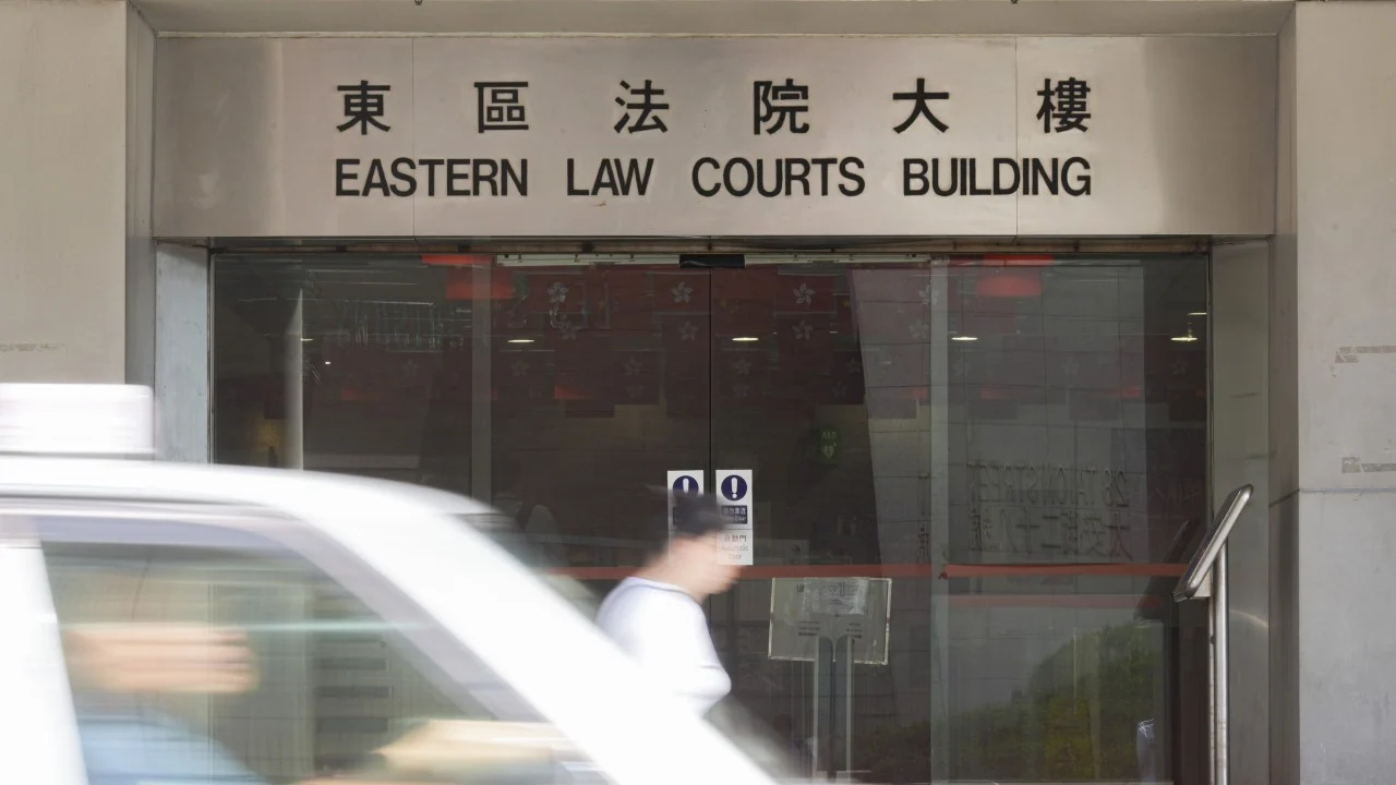 Hong Kong government statistician cleared of loitering charge near girls’ school