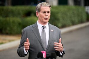 Treasury Secretary Scott Bessent speaks to members of the media outside the White House in Washington on Thursday.