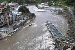 Rescuers search for thousands following deadly Nepal-China flood