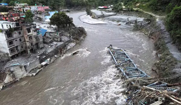 Rescuers search for thousands following deadly Nepal-China flood